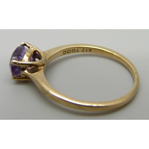 1191 - A 9ct gold and amethyst solitaire ring, 1.7g, L