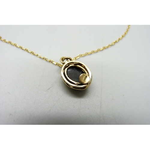 1199 - An 18ct gold pendant, set with black opal and chain, 4.3g