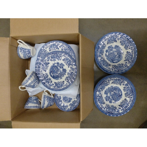 1234 - A 1982 blue Tonquin dinner set comprising six dinner plates, six soup plates, six side plates, six c... 