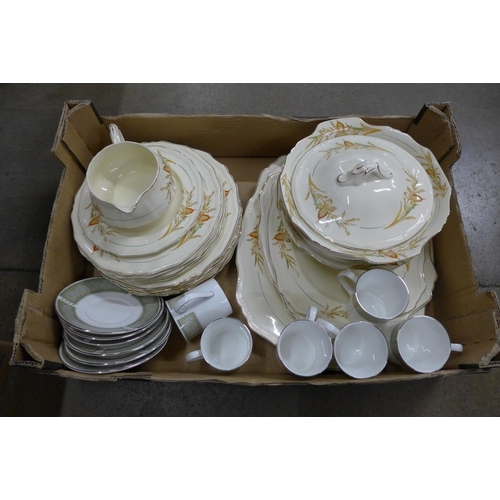 1254 - A set of six Staffordshire cups and saucers and an Alfred Meakin dinner service, three graduated pla... 