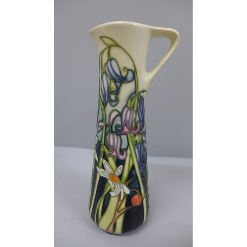 601 - A small Moorcroft jug shaped vase, 18.5cm