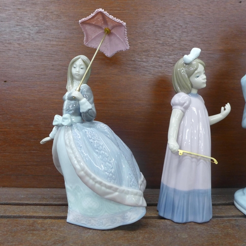 611 - Two Lladro figures including Dancing the Polka, one Nao and one other