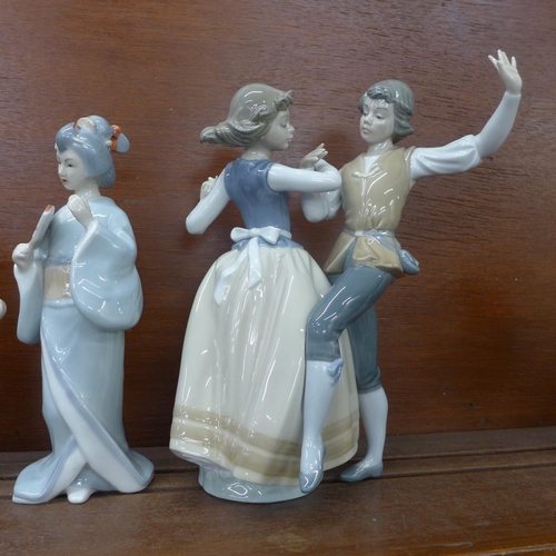 611 - Two Lladro figures including Dancing the Polka, one Nao and one other