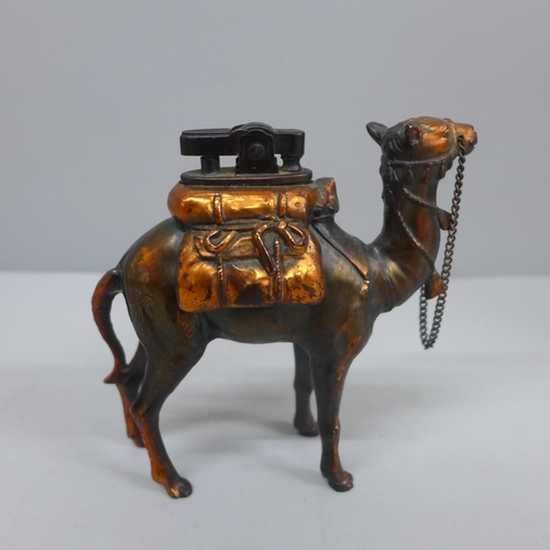 628 - A novelty table lighter in the form of a camel