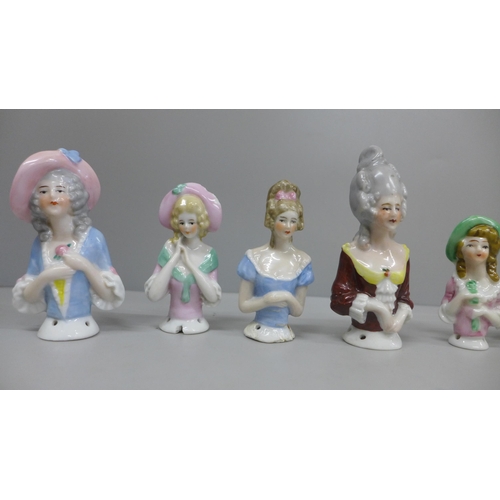 651 - A collection of nine porcelain half dolls