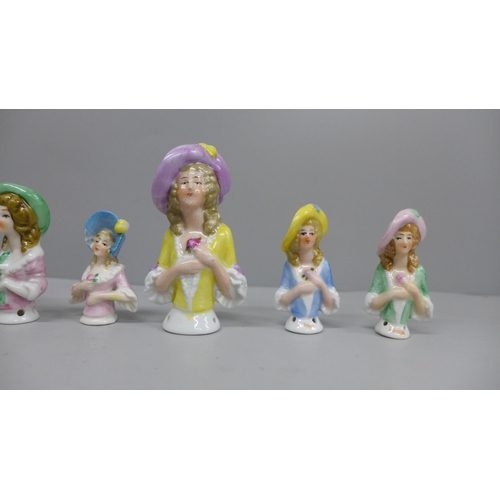 651 - A collection of nine porcelain half dolls