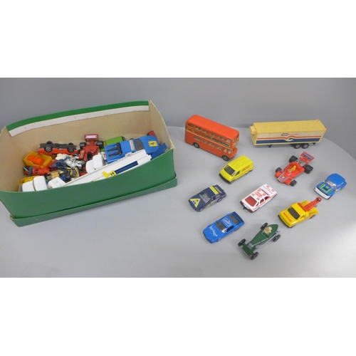 669 - A collection of die-cast model vehicles including boxed Corgi