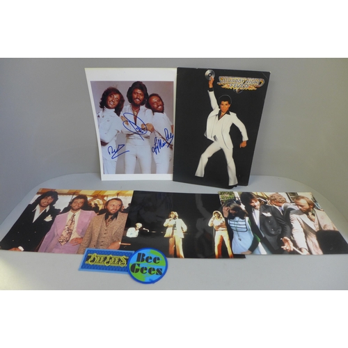 677 - Bee Gees collection of autographed photograph patches and promotional items