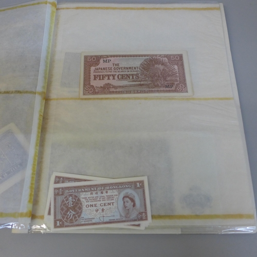 701 - Bank notes; duplicated stock of bank notes, including Chinese in album