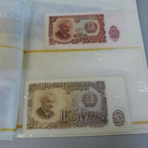 701 - Bank notes; duplicated stock of bank notes, including Chinese in album