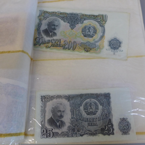 701 - Bank notes; duplicated stock of bank notes, including Chinese in album