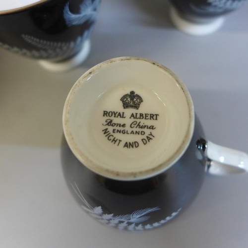 706 - Royal Albert Night and Day part coffee set, four cups, six saucers, a coffee pot with cream and suga... 