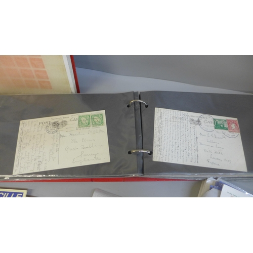 708 - Stamps:- Irish mint stamps in stockbook, album of postal history and selection of postal stationery