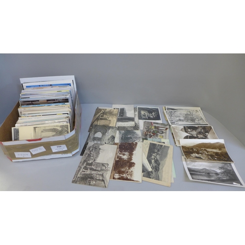 709 - Postcards; a box of postcards, vintage to modern