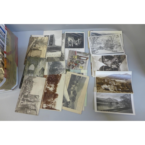 709 - Postcards; a box of postcards, vintage to modern