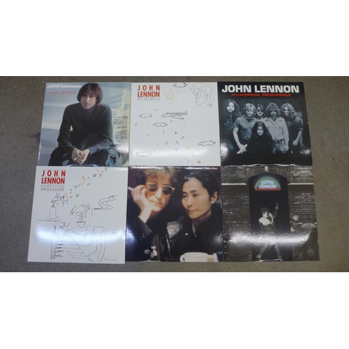 716 - A John Lennon/Plastic One Band box set, nine white vinyl albums, 174/200 (1987)