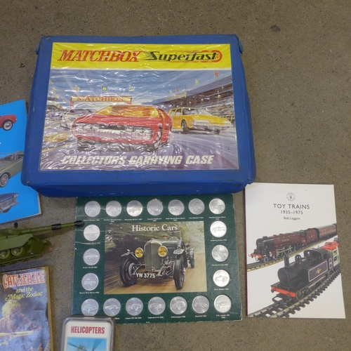 739 - Sets of Top Trump cards, a Historic Cars medallions set, a Matchbox carry case (empty)