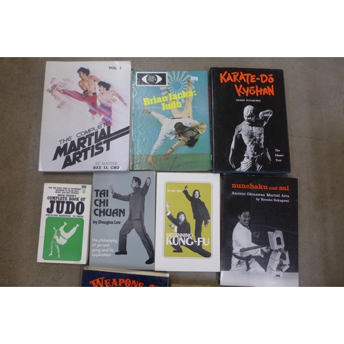 766 - A collection of books relating to martial arts and judo