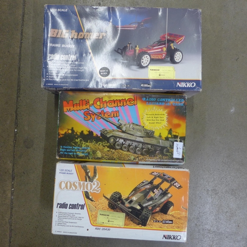 770 - Two Nikko remote control cars and a remote control tank