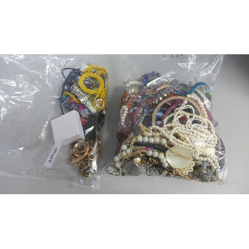 775 - Two bags of costume jewellery; bangles and necklaces