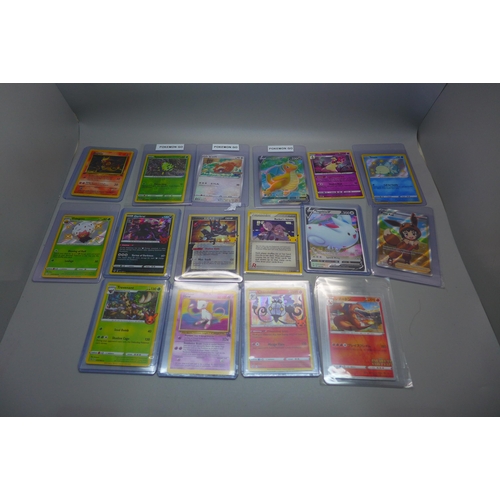 840 - Sixteen Pokemon cards including Japanese Charizard, promo, new, V-Cards, 1st Edition Magmar, etc.