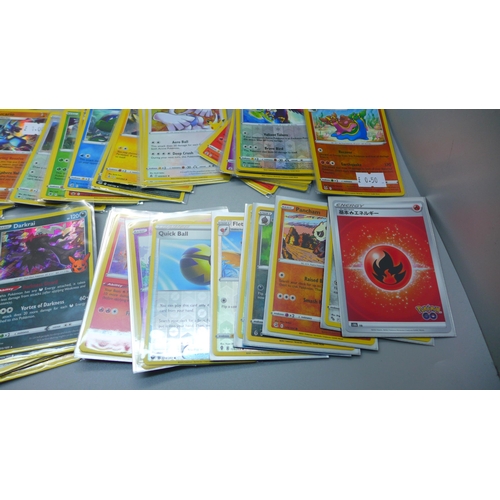 850 - 100 Holo and reverse holo Pokemon cards