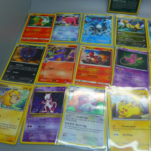 852 - Twenty-two vintage Pokemon cards from various sets