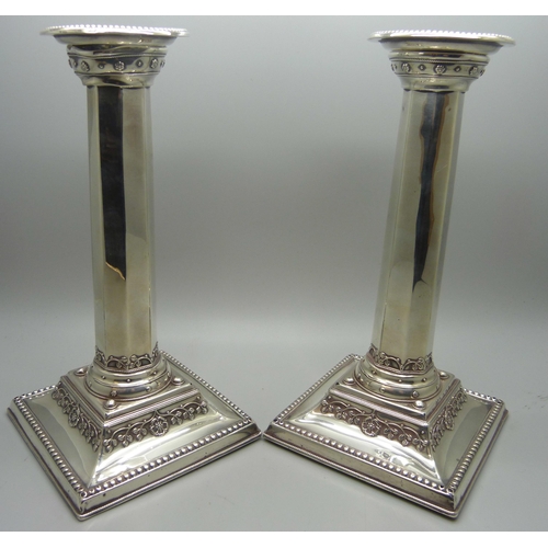 868 - A pair of silver candlesticks, Liberty & Co., Birmingham 1907, height 20cm