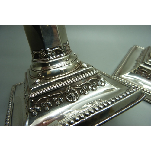 868 - A pair of silver candlesticks, Liberty & Co., Birmingham 1907, height 20cm