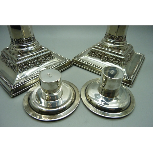 868 - A pair of silver candlesticks, Liberty & Co., Birmingham 1907, height 20cm