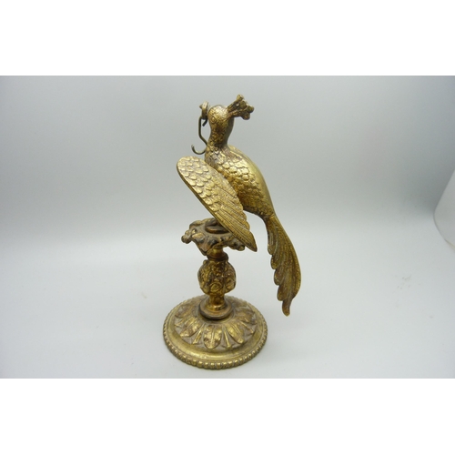 870 - A gilt brass watch stand in the form of a bird