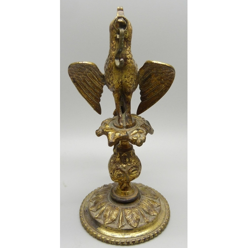 870 - A gilt brass watch stand in the form of a bird