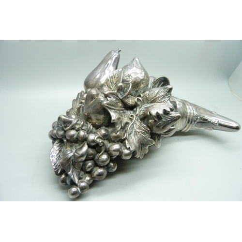 886 - A silver covered table centrepiece, 21cm