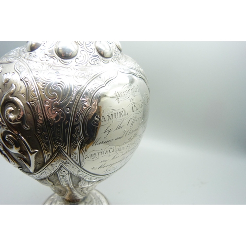 890 - A Victorian silver ewer, London 1864, with long service engraving to Samuel Clark, Australasian Stea... 