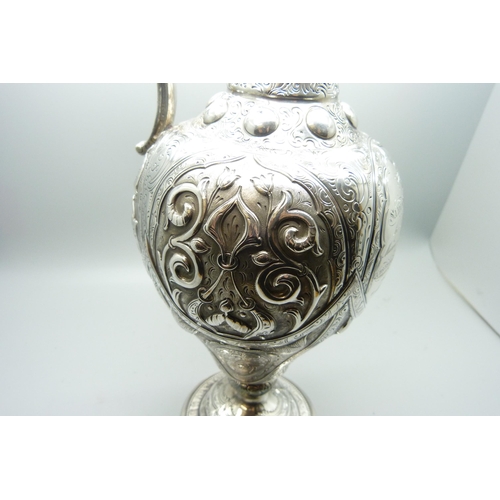 890 - A Victorian silver ewer, London 1864, with long service engraving to Samuel Clark, Australasian Stea... 