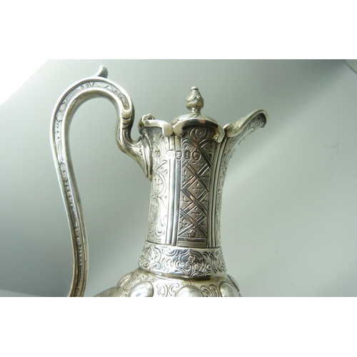 890 - A Victorian silver ewer, London 1864, with long service engraving to Samuel Clark, Australasian Stea... 