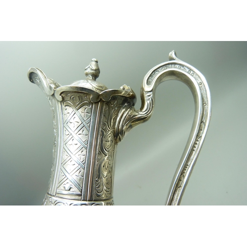 890 - A Victorian silver ewer, London 1864, with long service engraving to Samuel Clark, Australasian Stea... 