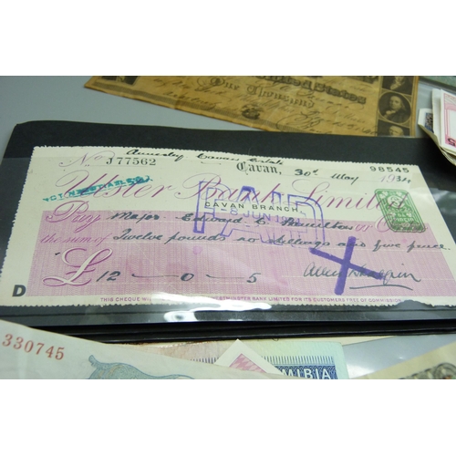 891 - A collection of foreign banknotes and cheques