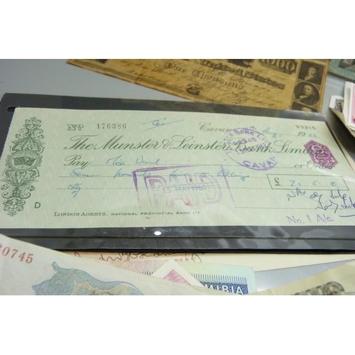 891 - A collection of foreign banknotes and cheques