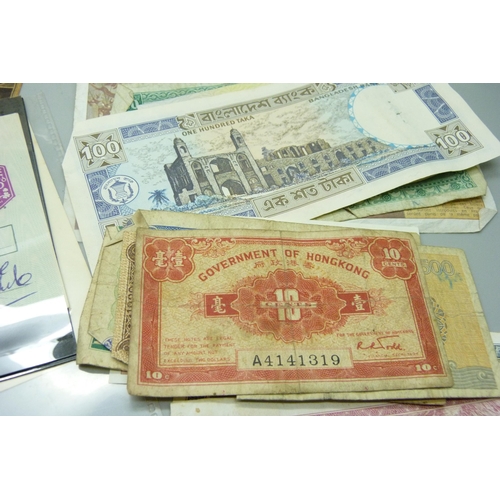 891 - A collection of foreign banknotes and cheques