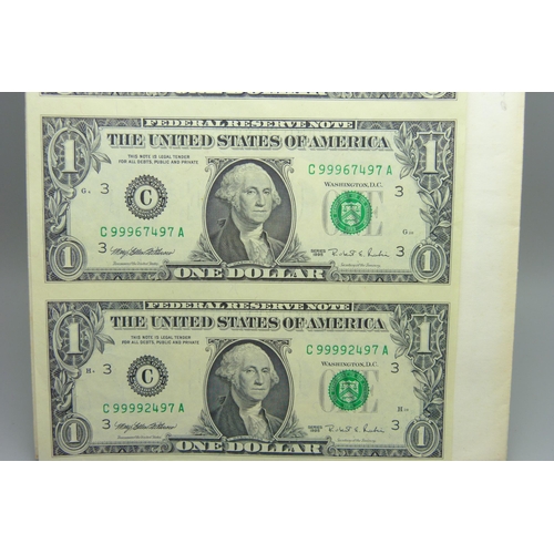 893 - A sheet of four US one dollar banknotes, uncut