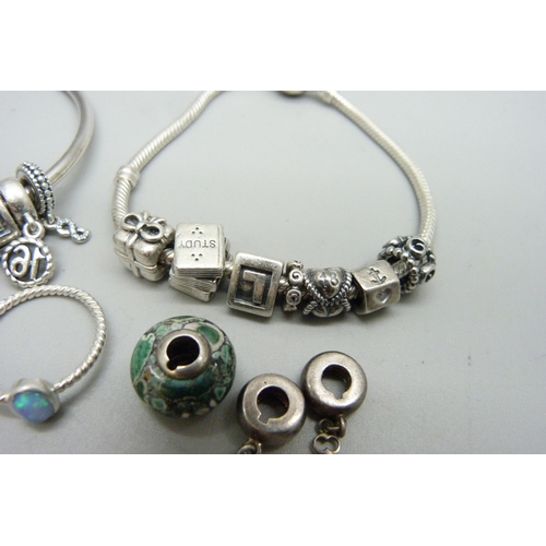 896 - Two Pandora bracelets with charms and a Pandora ring