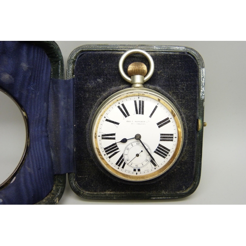 898 - A silver fronted watch stand with a Goliath pocket watch