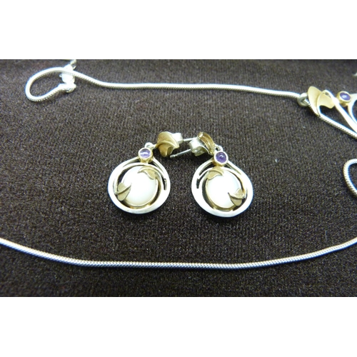 905 - A silver Art Nouveau style necklace and earrings