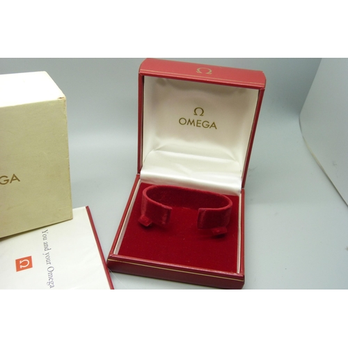 907 - A Omega watch box, outer box and papers