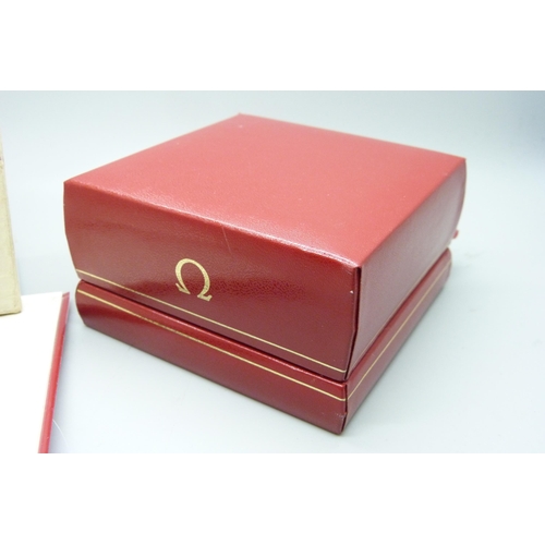 907 - A Omega watch box, outer box and papers