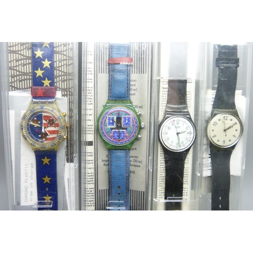 908 - Four boxed Swatch wristwatches