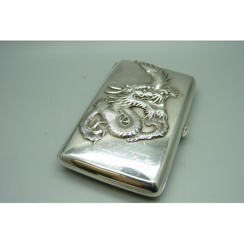 913 - A plated cigar case embossed with a Chinese dragon, 125mm x 80mm