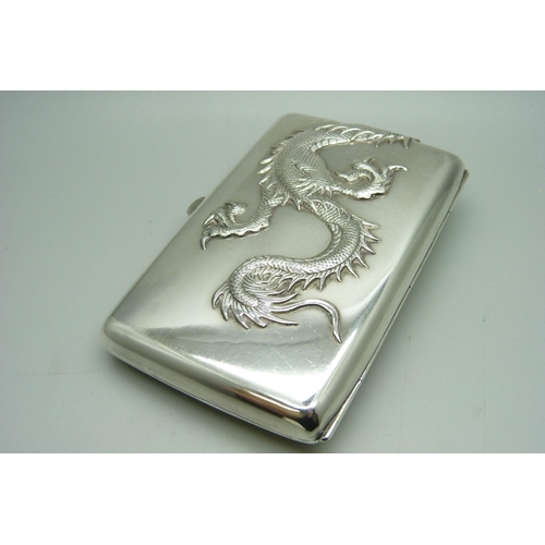 913 - A plated cigar case embossed with a Chinese dragon, 125mm x 80mm