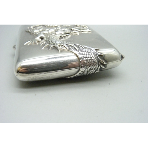 913 - A plated cigar case embossed with a Chinese dragon, 125mm x 80mm